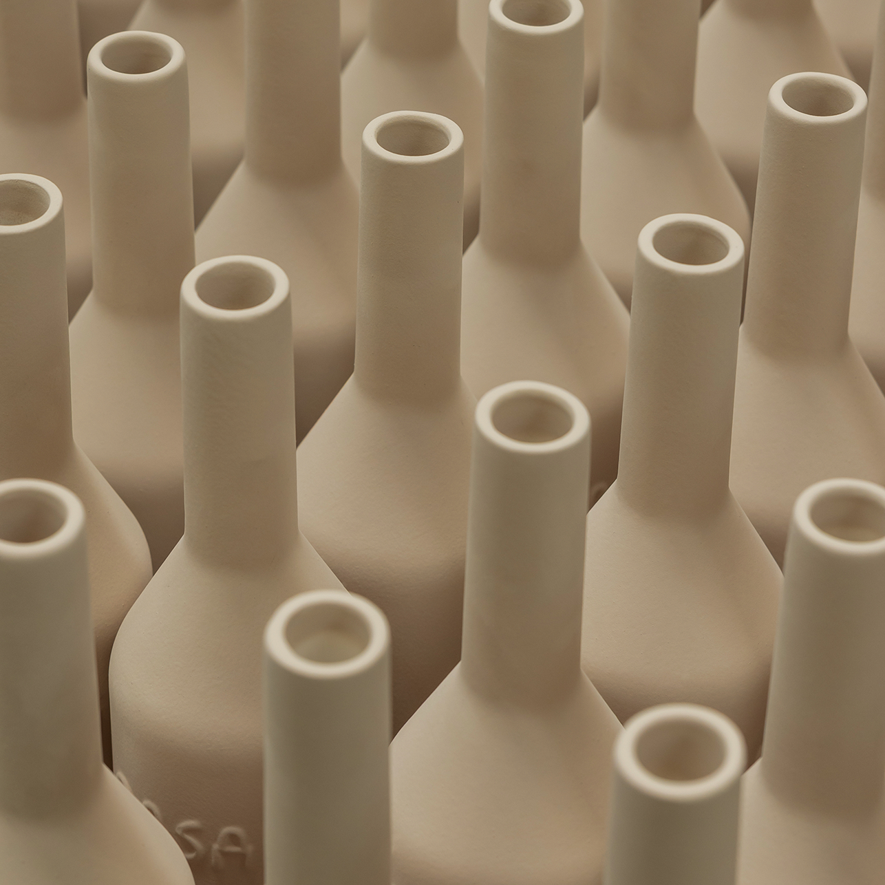 A LOOK INTO OUR HANDMADE PORCELAIN BOTTLES