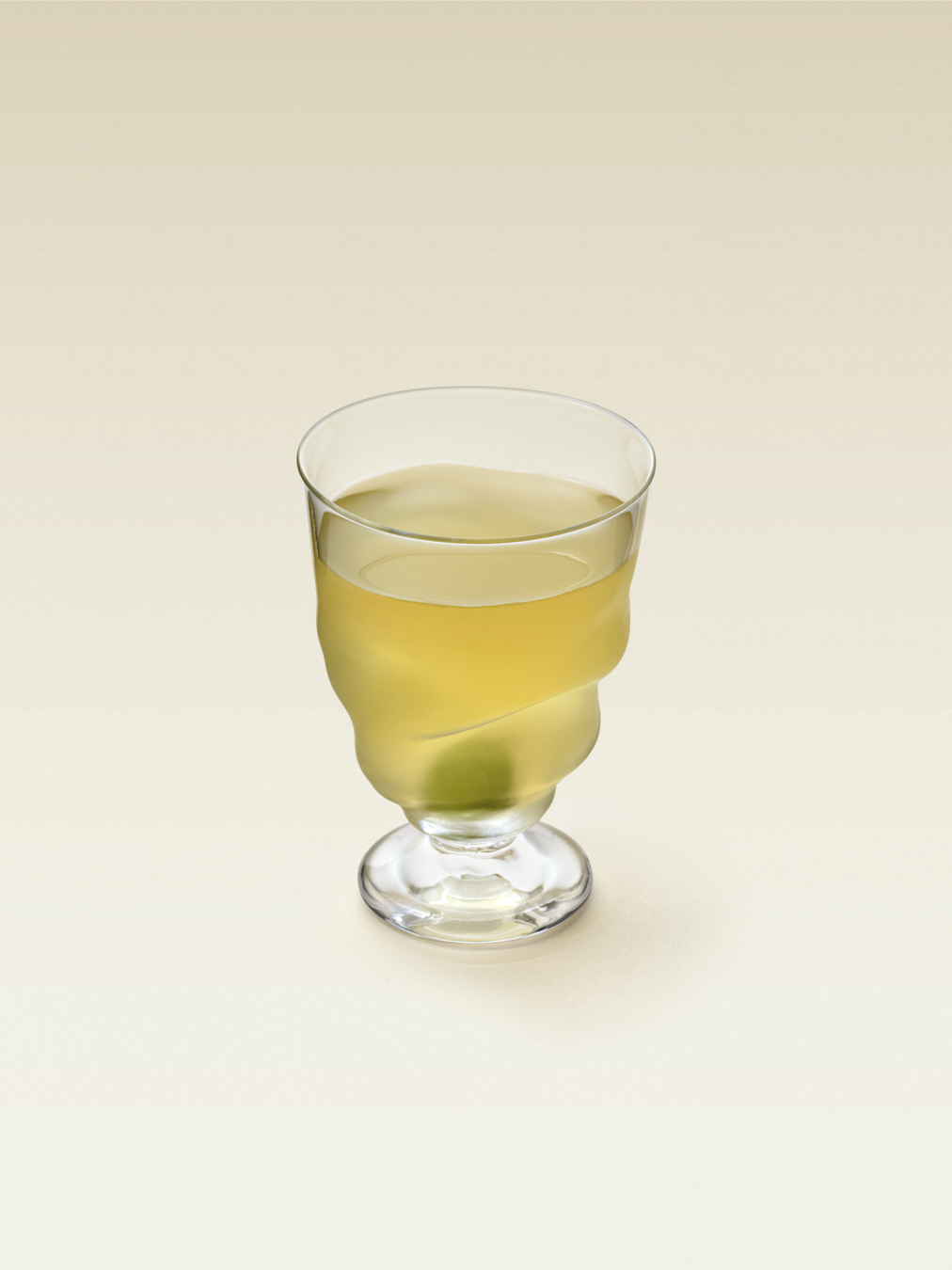 A cocktail glass with orange liquid inside along with a green olive on the bottom,displaying a Mexican Martini cocktail.